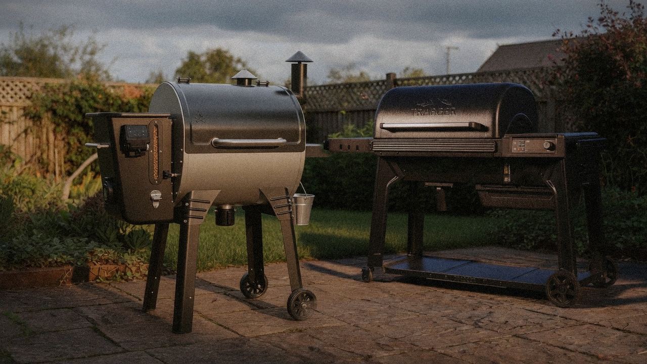 Camp Chef Woodwind WiFi 24 beside Traeger Pro 780, editorial product photography
