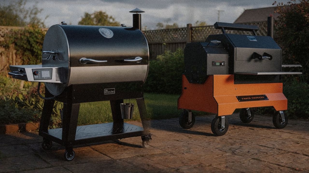recteq Flagship 1600 standing next to Yoder Smokers YS640s, showing the size and price-tier gap